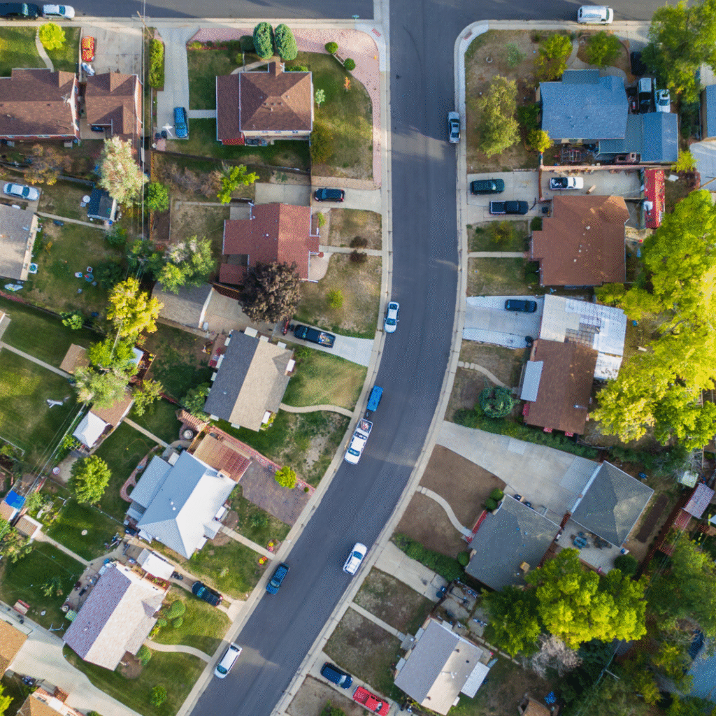 Aerial view of a neighborhood, representing the zip codes Norwest Roofing serves